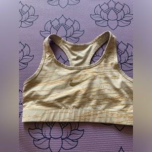 Gold and light tan Nike sports bra